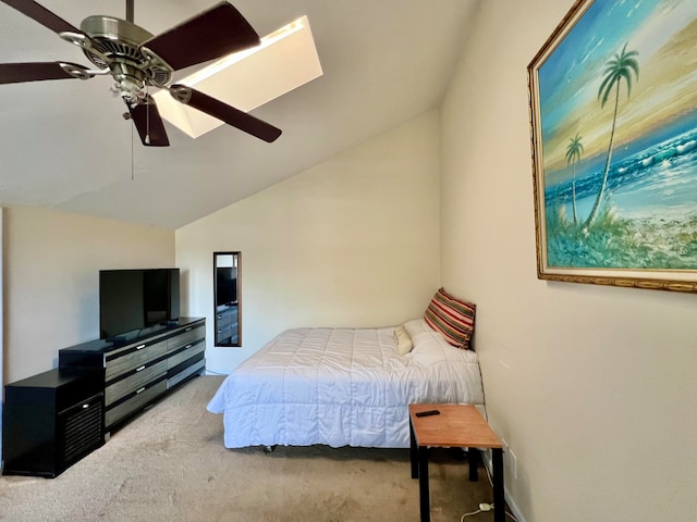 carpeted bedroom featuring vaulted ceiling and ceiling fan