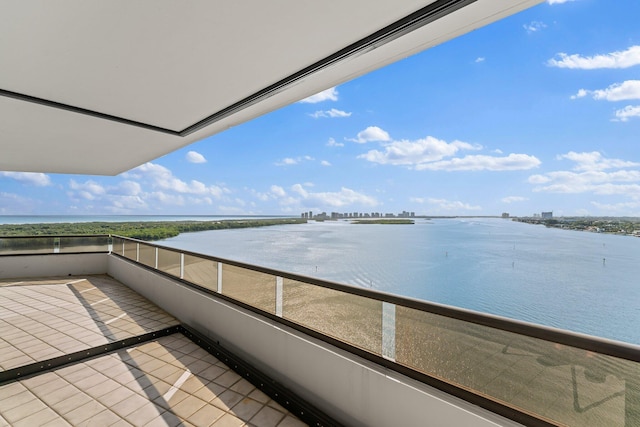 balcony featuring a water view