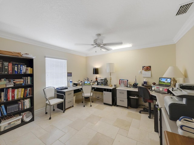 home office featuring visible vents, baseboards, a ceiling fan, and crown molding