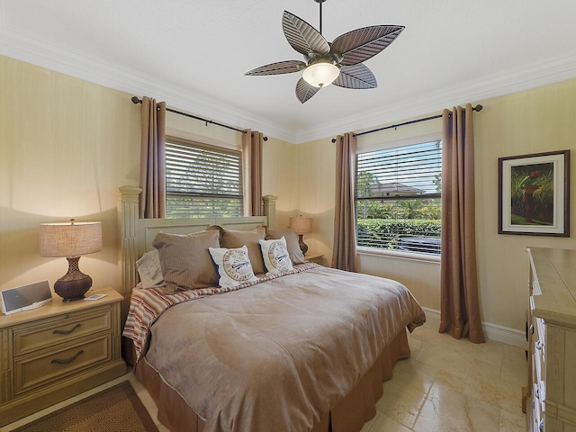 bedroom with multiple windows, ceiling fan, baseboards, and ornamental molding