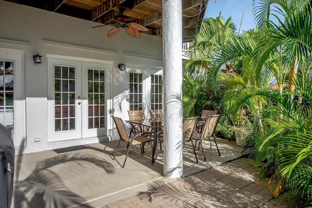 view of patio featuring ceiling fan and french doors