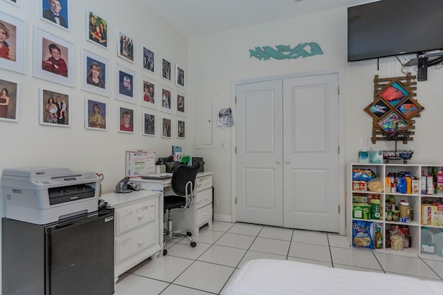 office area featuring light tile patterned flooring