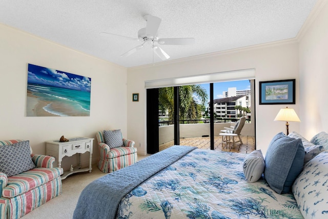 bedroom with light carpet, ceiling fan, access to exterior, ornamental molding, and a textured ceiling