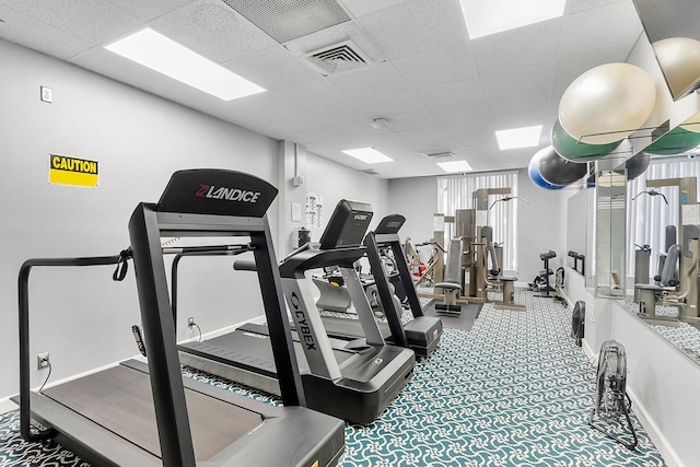 gym with a drop ceiling