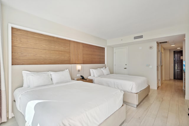 bedroom featuring light wood-type flooring