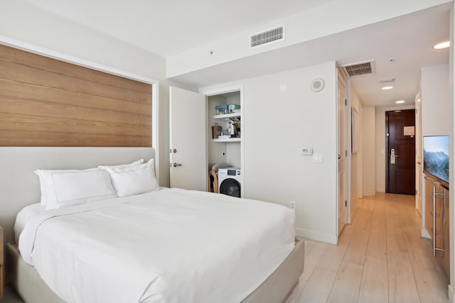 bedroom with light wood-type flooring