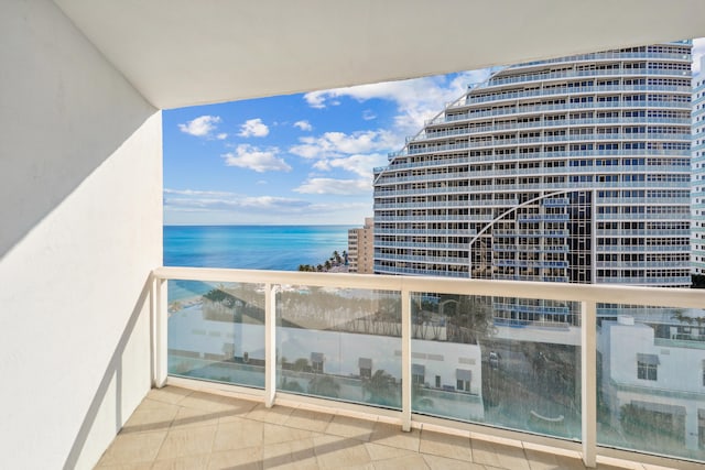 balcony featuring a water view