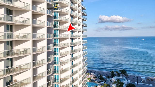 view of property with a water view