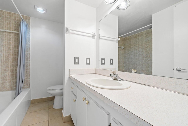 full bathroom with toilet, shower / bath combo with shower curtain, large vanity, and tile flooring