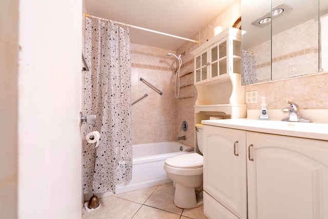 full bathroom featuring vanity, toilet, tile patterned floors, and shower / tub combo with curtain