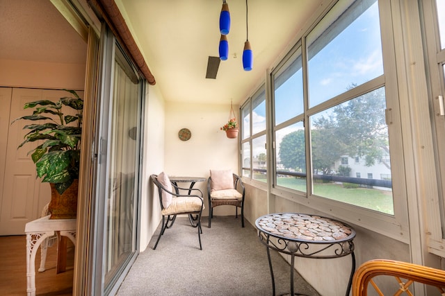 sunroom with plenty of natural light