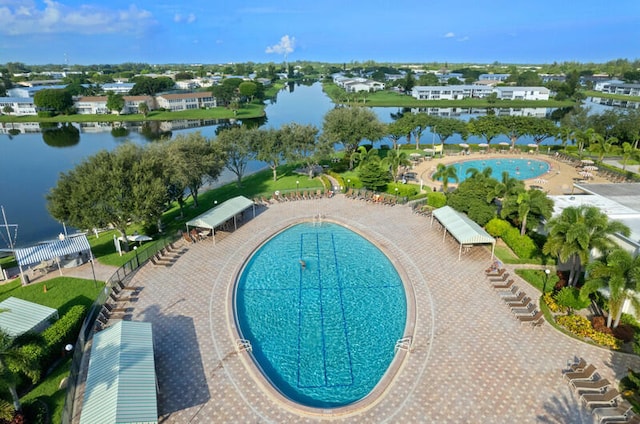 birds eye view of property featuring a water view