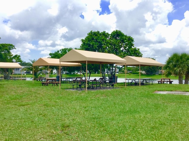 view of home's community with a yard and a gazebo