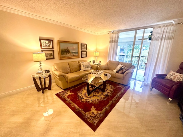 living room featuring crown molding, a textured ceiling, and a wall of windows