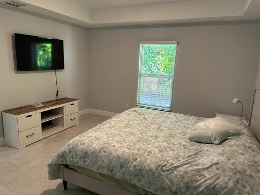 bedroom featuring visible vents