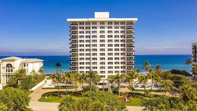 view of building exterior with a water view