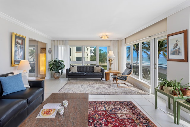 living room featuring crown molding and light tile patterned floors