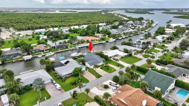 aerial view with a water view and a residential view