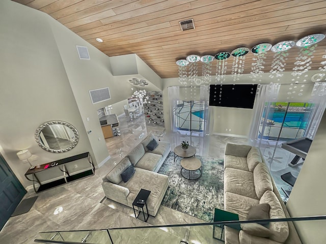 living room featuring lofted ceiling and wooden ceiling