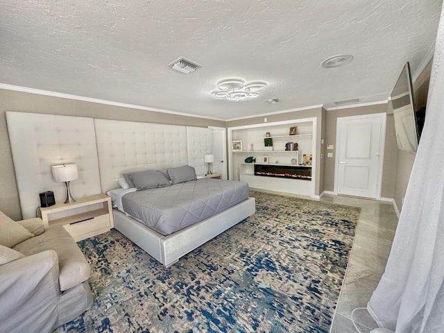 bedroom featuring a fireplace, a textured ceiling, and ornamental molding