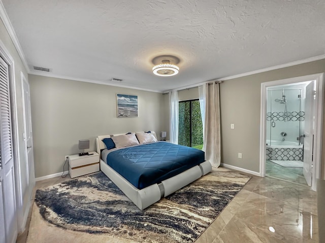 bedroom featuring a textured ceiling, ensuite bathroom, and crown molding