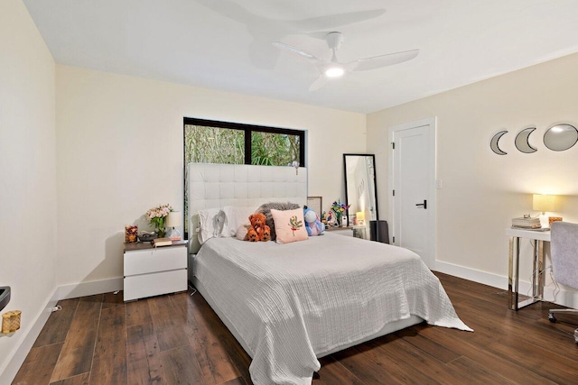 bedroom with ceiling fan and dark hardwood / wood-style flooring