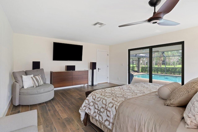 bedroom featuring dark wood-type flooring, access to outside, and ceiling fan