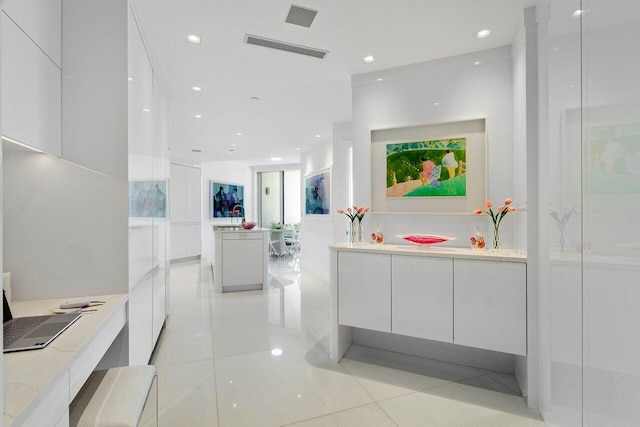 interior space featuring light tile patterned floors