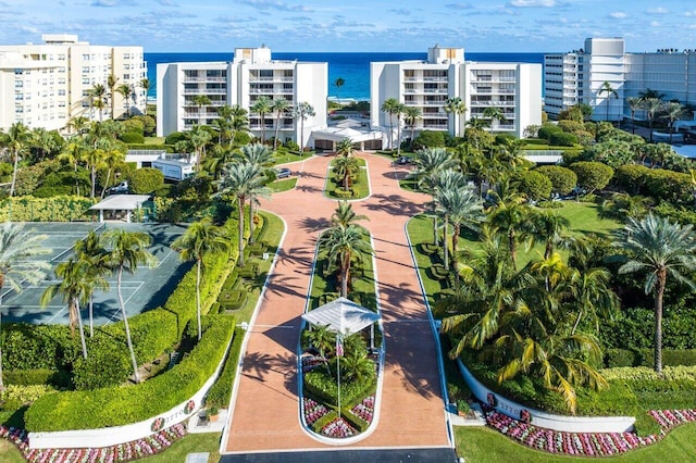 birds eye view of property with a water view