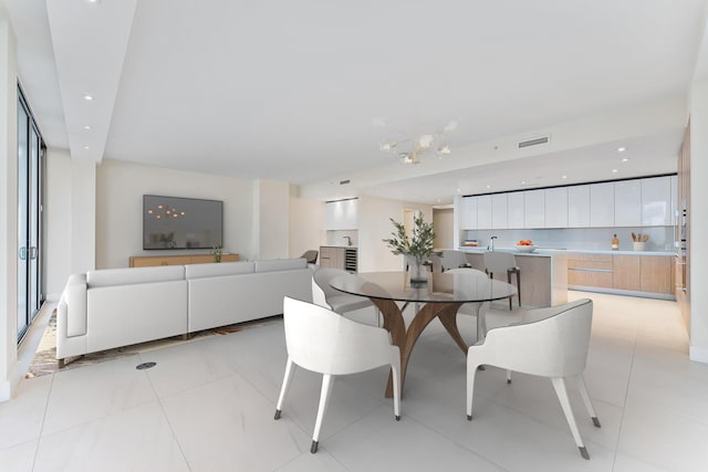 dining space featuring visible vents and recessed lighting