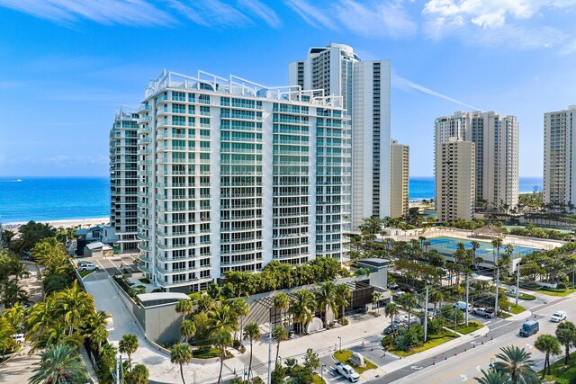 exterior space with a view of city and a water view