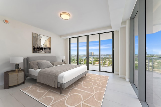 bedroom with access to outside, light tile patterned floors, and floor to ceiling windows