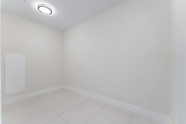 empty room with tile patterned floors