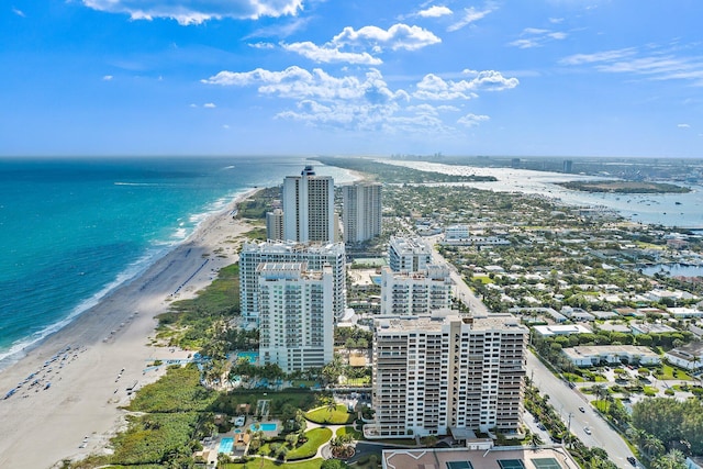 bird's eye view with a view of the beach, a water view, and a view of city