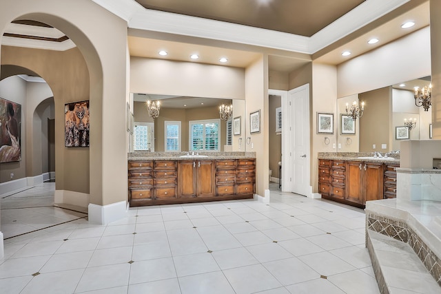 bathroom featuring vanity, toilet, tile patterned flooring, and ornamental molding