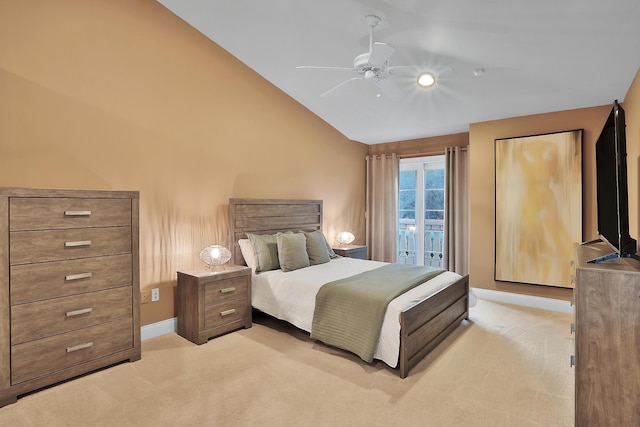 carpeted bedroom with ceiling fan, access to exterior, and vaulted ceiling