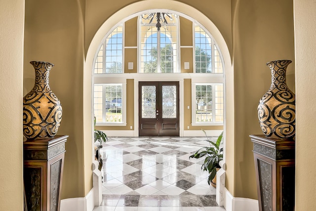 entryway featuring french doors