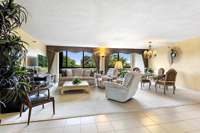 living room with light tile patterned flooring, a textured ceiling, and a chandelier