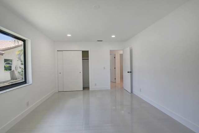 unfurnished bedroom featuring a closet