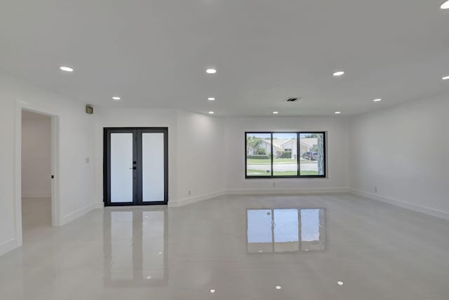 empty room featuring french doors