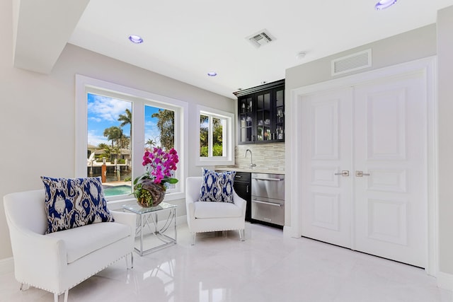 living area with light tile floors