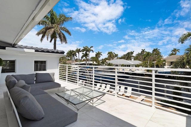 view of patio / terrace featuring a balcony and an outdoor living space