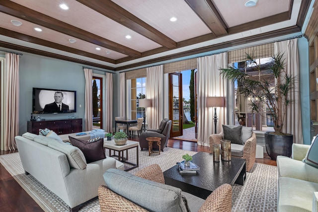 interior space with ornamental molding, beam ceiling, and wood-type flooring