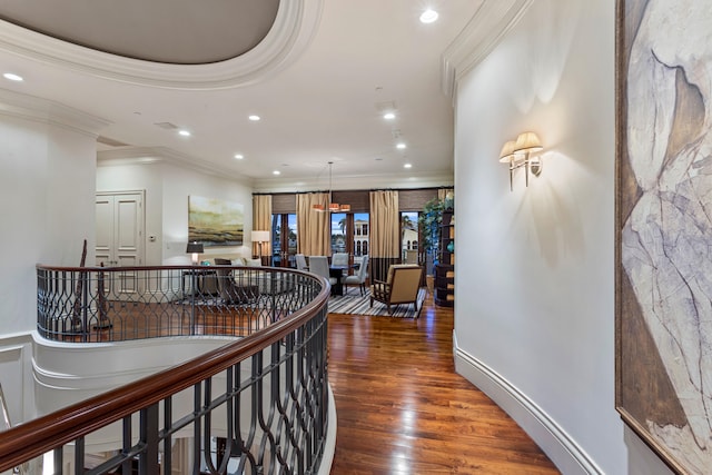 corridor featuring dark hardwood / wood-style floors and ornamental molding