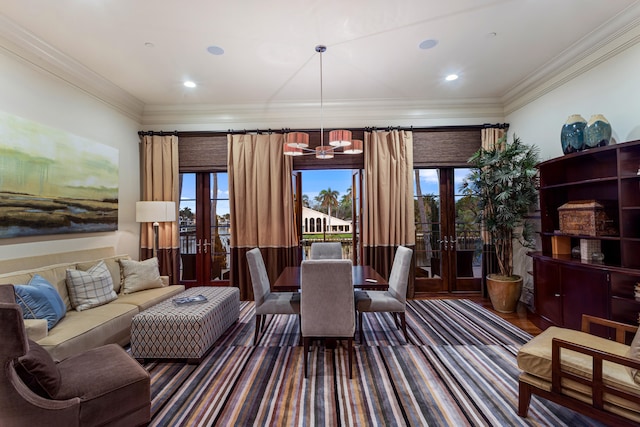 dining area featuring french doors and crown molding