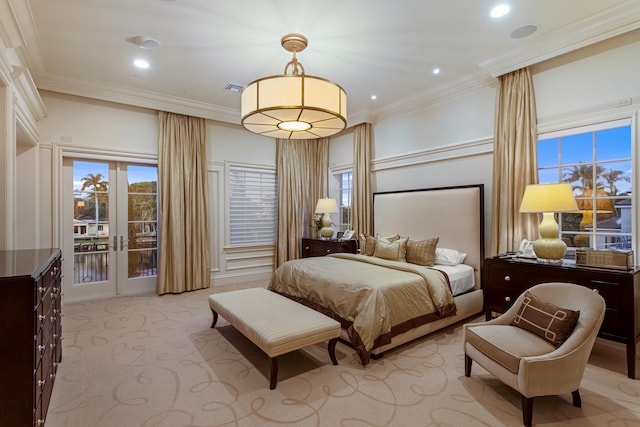 carpeted bedroom featuring french doors, access to outside, and crown molding