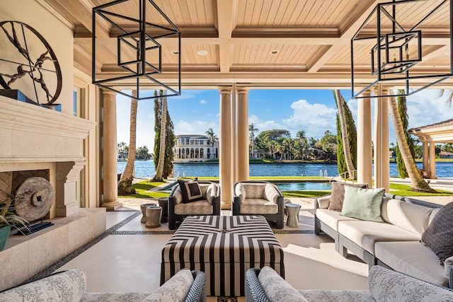 view of patio featuring an outdoor hangout area and a water view