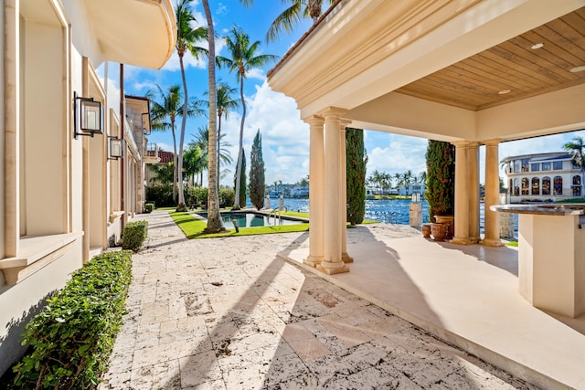 view of patio / terrace with a water view