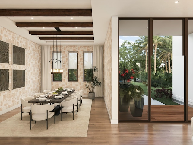 dining room featuring beamed ceiling, a chandelier, and light hardwood / wood-style floors