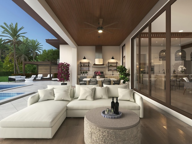 view of patio / terrace with ceiling fan and an outdoor living space